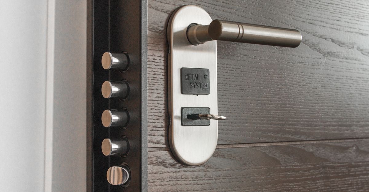 locksmith unlocking front door — Coastal Pro Locksmiths